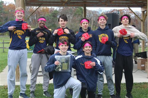The 2024 KE Boys XC team with their 2nd-place patches and plaque!